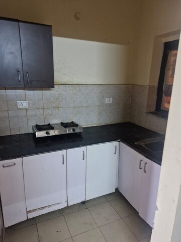 Kitchen in 1 RK Apartment at Jaipuria Sunrise Green, Lohgarh – for Rent