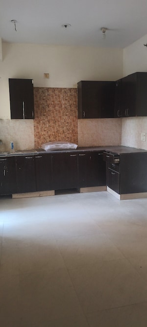 Kitchen in 3 BHK Apartment at Aims Golf City, Sector 75 – for Rent