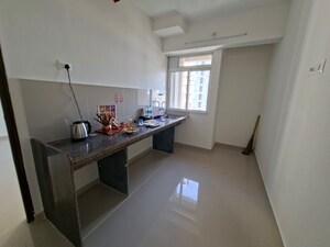 Kitchen in 1 BHK Apartment at Godrej Emerald, Ghodbunder Road – for Rent