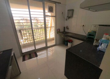 Kitchen in 2 BHK Apartment at Soham Tropical Lagoon, Ghodbunder Road – for Sale
