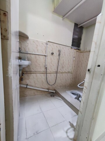 Bathroom in 2 BHK Apartment at Guru Ganesh Nagar Society, Kothrud – for Rent