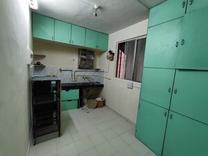 Kitchen in 2 BHK Apartment at Guru Ganesh Nagar Society, Kothrud – for Rent