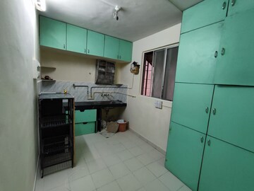 Kitchen in 2 BHK Apartment at Guru Ganesh Nagar Society, Kothrud – for Rent