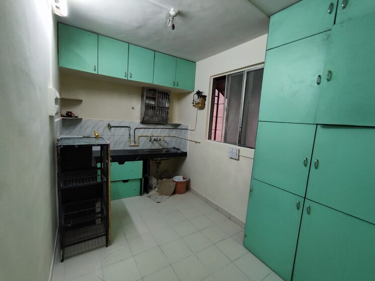 Kitchen, guru-ganesh-nagar-society 2 Bedroom 850 Sq.Ft. Apartment In Kothrud Pune 9630915