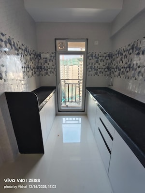 Kitchen in 1 BHK Apartment at Raunak Bliss, Ghodbunder Road – for Rent