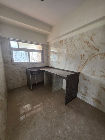 Kitchen in 3 BHK Apartment at Darvesh Quettawalla Residency, Agripada – for Sale