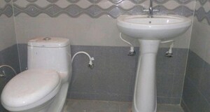 Bathroom in 3 BHK Builder Floor at Sahastradhara Road – for Sale