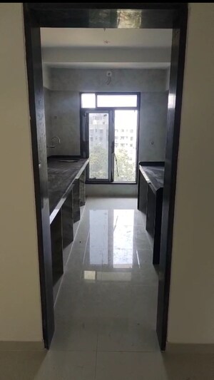 Kitchen in 3 BHK Apartment at Vaishno Sky, Malad East – for Rent