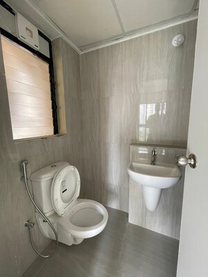 Bathroom in 1.5 BHK Apartment at Runwal Gardens Phase I, Dombivli East – for Sale