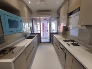 Kitchen in 4 BHK Apartment at Evershine CHS, Khar West – for Sale