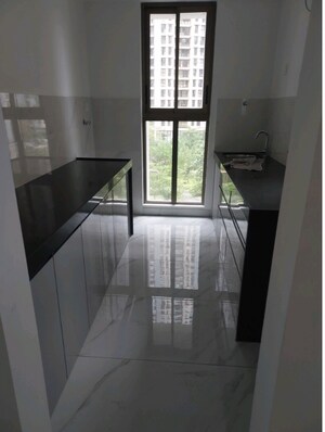 Kitchen in 1 BHK Apartment at Raymond Ten X Habitat, Pokhran Road No Two – for Rent