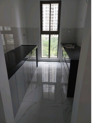 Kitchen in 1 BHK Apartment at Raymond Ten X Habitat, Pokhran Road No Two – for Rent