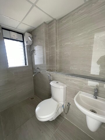 Bathroom in 1 BHK Apartment at Runwal Gardens Phase I, Dombivli East – for Rent