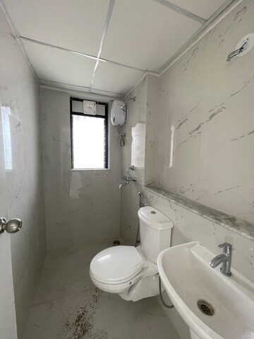 Bathroom in 2 BHK Apartment at Runwal Gardens Phase I, Dombivli East – for Sale