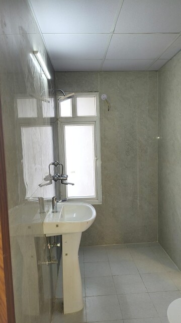 Bathroom in 2 BHK Apartment at VIctoryone Amara, Sector 16 Greater Noida – for Sale