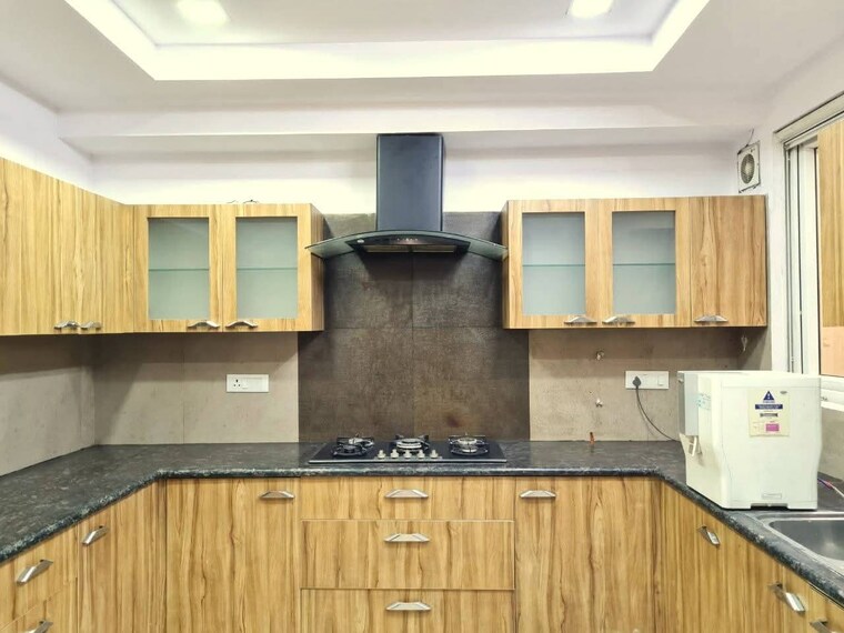 Kitchen, freedom fighters enclave 4 Bedroom 2100 Sq.Ft. Apartment In Freedom Fighters Enclave Delhi 9631417