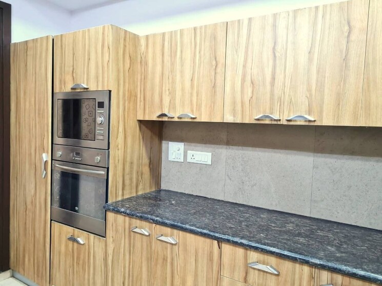 Kitchen, freedom fighters enclave 4 Bedroom 2100 Sq.Ft. Apartment In Freedom Fighters Enclave Delhi 9631417