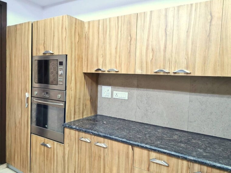 Kitchen, freedom fighters enclave 4 Bedroom 2100 Sq.Ft. Apartment In Freedom Fighters Enclave Delhi 9631417