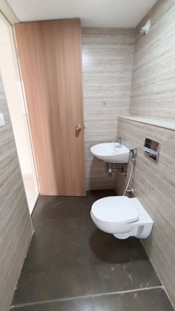 Bathroom in 1 BHK Apartment at Runwal Gardens, Dombivli East – for Rent