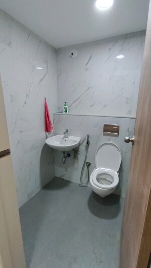 Bathroom in 1 BHK Apartment at Runwal Gardens, Dombivli East – for Rent