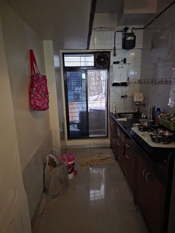 Kitchen in 1.5 BHK Apartment at Global Shivam Centrium, Andheri East – for Rent