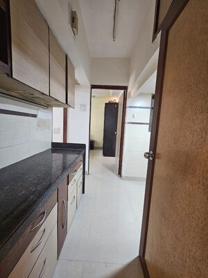 Kitchen in 1 BHK Apartment at Thakur Village, Kandivali East – for Rent