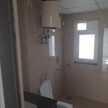 Bathroom in 3 BHK Apartment at Rishita Manhattan, Sarsawan – for Rent