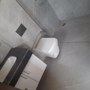 Bathroom in 3 BHK Apartment at Rishita Manhattan, Sarsawan – for Rent