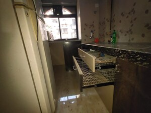 Kitchen in 1 BHK Apartment at Green Fields Apartment, Andheri East – for Rent