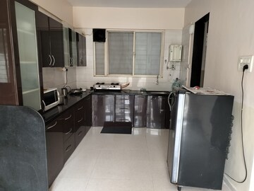 Kitchen in 3 BHK Apartment at Sukhwani Elmwood, Pimple Saudagar – for Rent