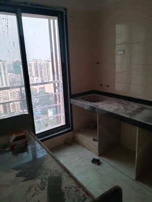 Kitchen in 1 RK Apartment at Om Siddhivinayak CHS, Kandivali East – for Sale