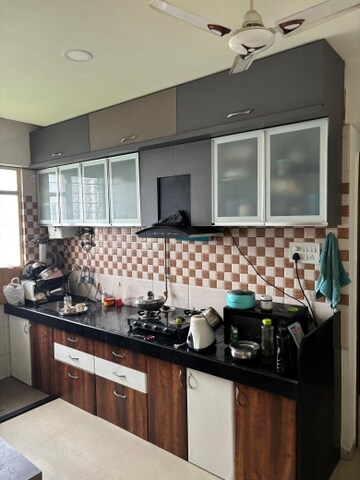 Kitchen in 2 BHK Apartment at Chandrarang Oriana, Pimple Gurav – for Rent