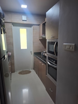 Kitchen in 4 BHK Apartment at Courtyard by Narang Realty and The Wadhwa Group, Pokhran Road No Two – for Rent