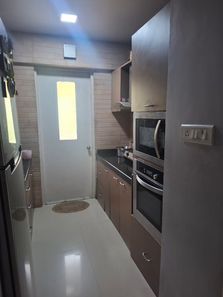 Kitchen, courtyard-by-narang-realty-and-the-wadhwa-group 4 Bedroom 1400 Sq.Ft. Apartment In Pokhran Road No Two Thane 9631590