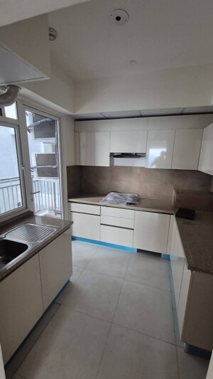 Kitchen in 3 BHK Apartment at Godrej Meridien, Sector 106 – for Rent