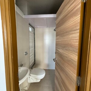 Bathroom in 1 BHK Apartment at Marathon NeoSkies, Kokan Nagar – for Rent