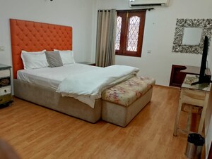 Bedroom in 4 BHK Apartment at Geetanjali Enclave – for Rent