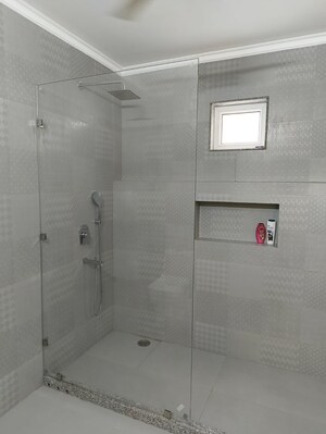 Bathroom in 4 BHK Apartment at Geetanjali Enclave – for Rent