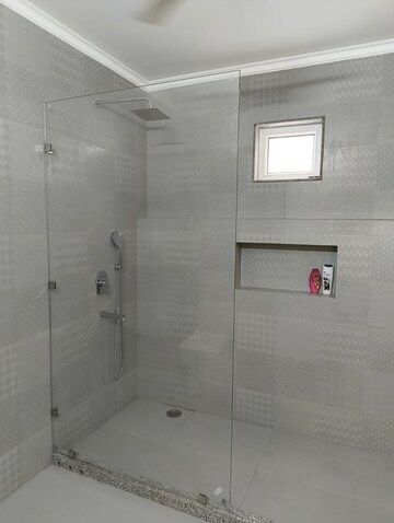 Bathroom in 4 BHK Apartment at Geetanjali Enclave – for Rent