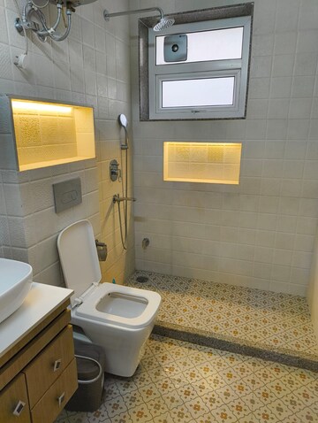 Bathroom in 4 BHK Apartment at Geetanjali Enclave – for Rent