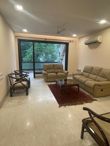 Living Room in 4 BHK Apartment at Vasant Vihar – for Rent