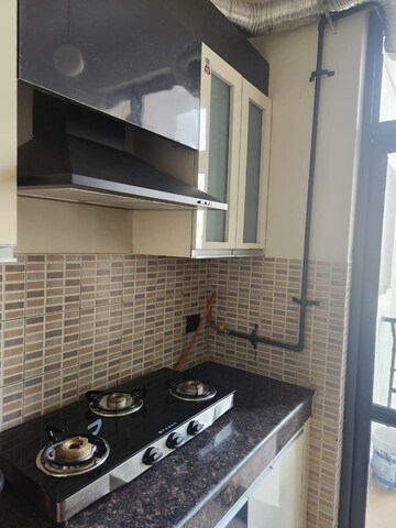 Kitchen in 3 BHK Apartment at Jaypee Pavilion Heights IV, Sector 128 – for Rent