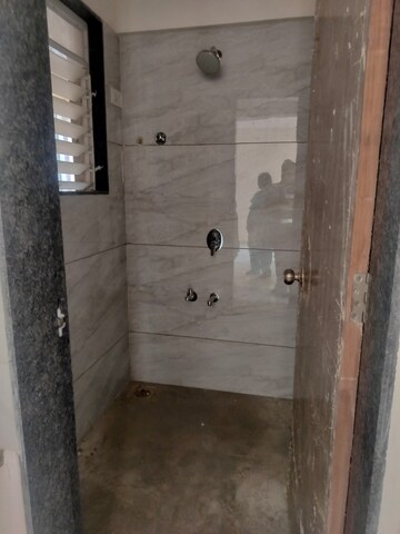 Bathroom in 1 BHK Apartment at Metropolis Bayside, Kasarvadavali – for Rent