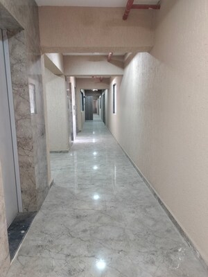 Building Lobby in 1 BHK Apartment at Metropolis Bayside, Kasarvadavali – for Rent