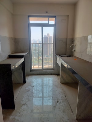 Kitchen in 1 BHK Apartment at Metropolis Bayside, Kasarvadavali – for Sale