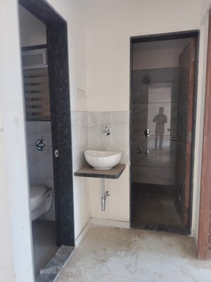Bathroom in 1 BHK Apartment at Metropolis Bayside, Kasarvadavali – for Sale