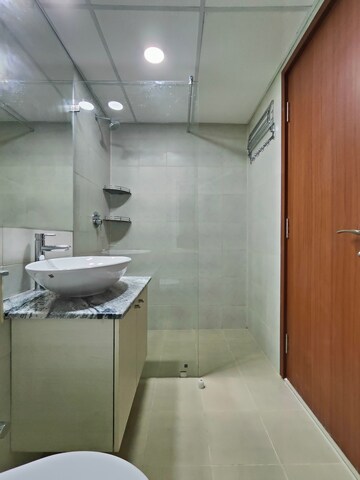 Bathroom in 3.5 BHK Apartment at Bhartiya Nikoo Homes Phase 2, Thanisandra Main Road – for Rent