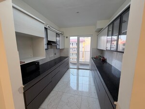 Kitchen in 3.5 BHK Apartment at Windlass River Valley, Harrawala – for Rent