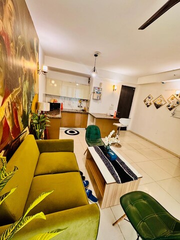 Living Room in 2 BHK Apartment at Urbtech Xaviers, Sector 168 – for Rent