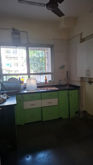 Kitchen in 1 BHK Apartment at Satellite Garden, Goregaon East – for Rent